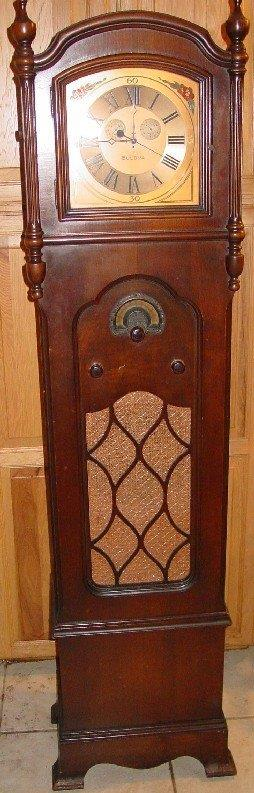 Bulova grandfather clock radio — first clock radio, combining a tube-based radio with a clock, 1928