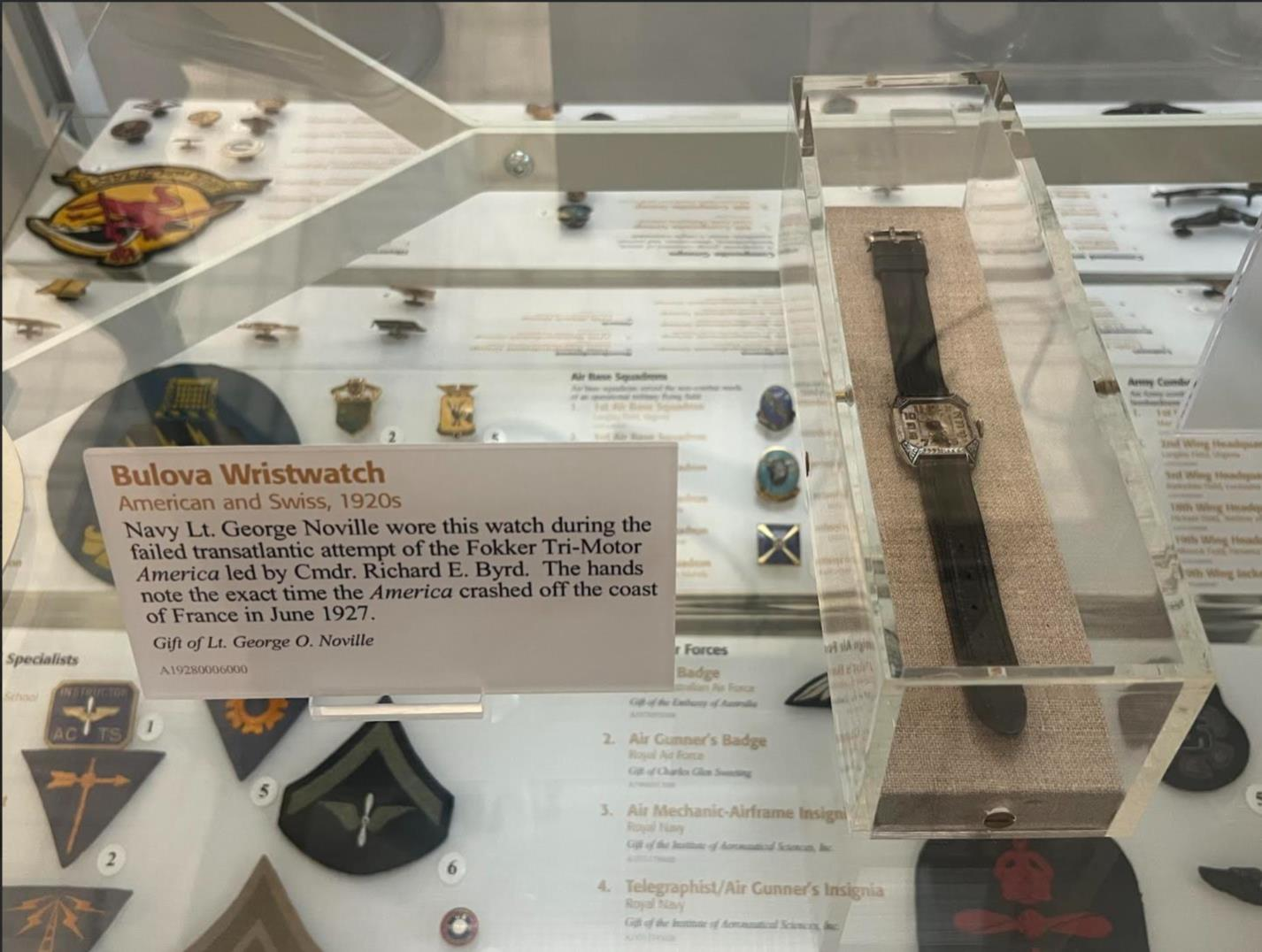 George Norville's Bulova wristwatch on display — hands stopped at the moment the America crashed off France, 1927